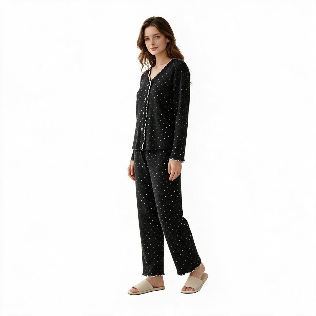 JOANNA FASHION black polka-dot long sleeve button-down pajama set with scalloped trim on a model