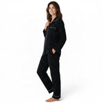 JOANNA FASHION black polka dot button-down pajama set with white contrast piping worn by a smiling woman