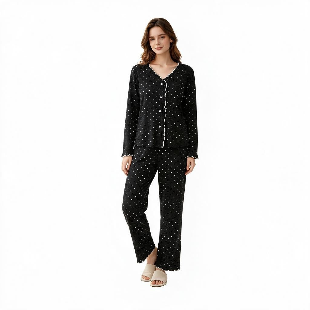 JOANNA FASHION black polka-dot long sleeve button-down pajama set with scalloped trim worn by a model