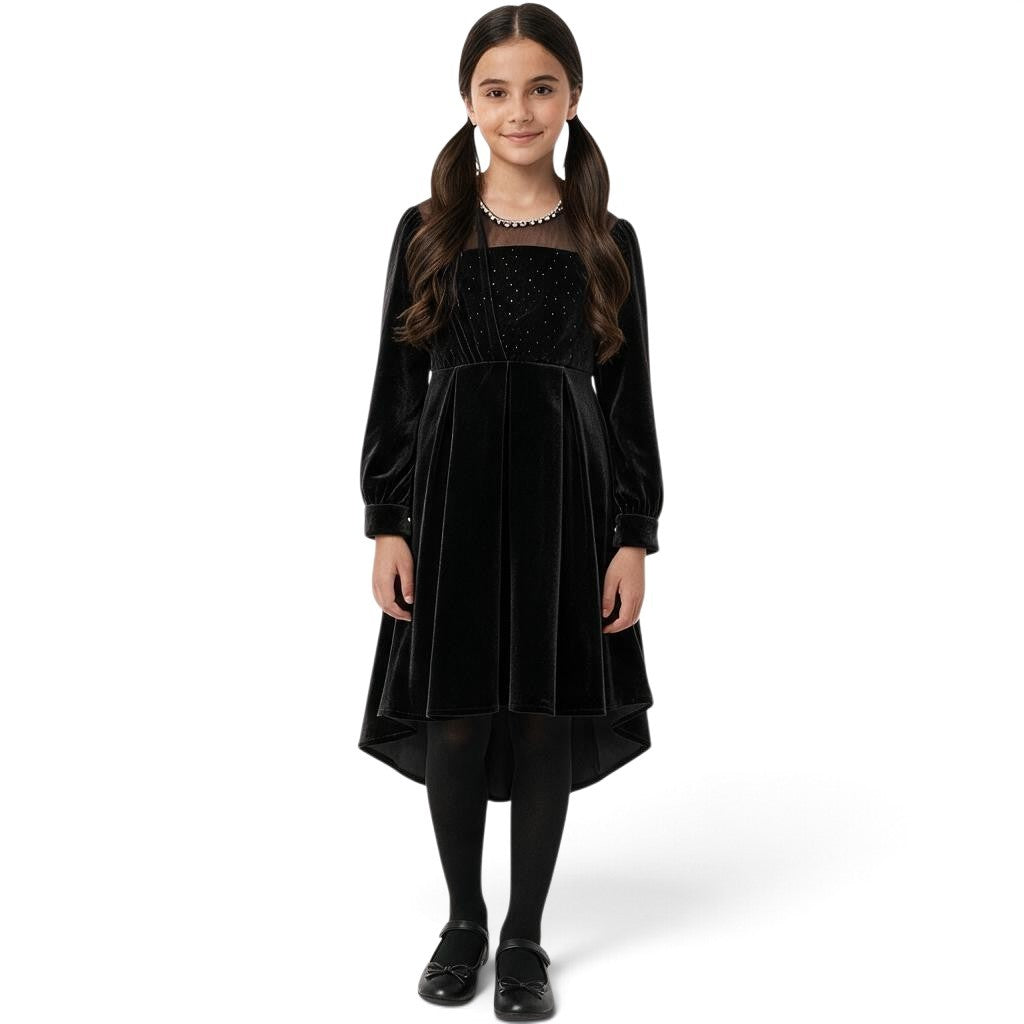 JOANNA FASHION girls black velvet high-low dress with sparkling bodice, sheer neckline, and pearl-like trim.