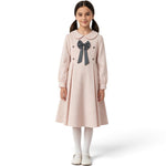 JOANNA FASHION girl wearing a blush pink long-sleeve dress with a Peter Pan collar, bow detail, and pleated skirt.