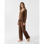 A model wearing a JOANNA FASHION brown ribbed long-sleeve lounge set with lettuce-edge trim and wide-leg trousers.