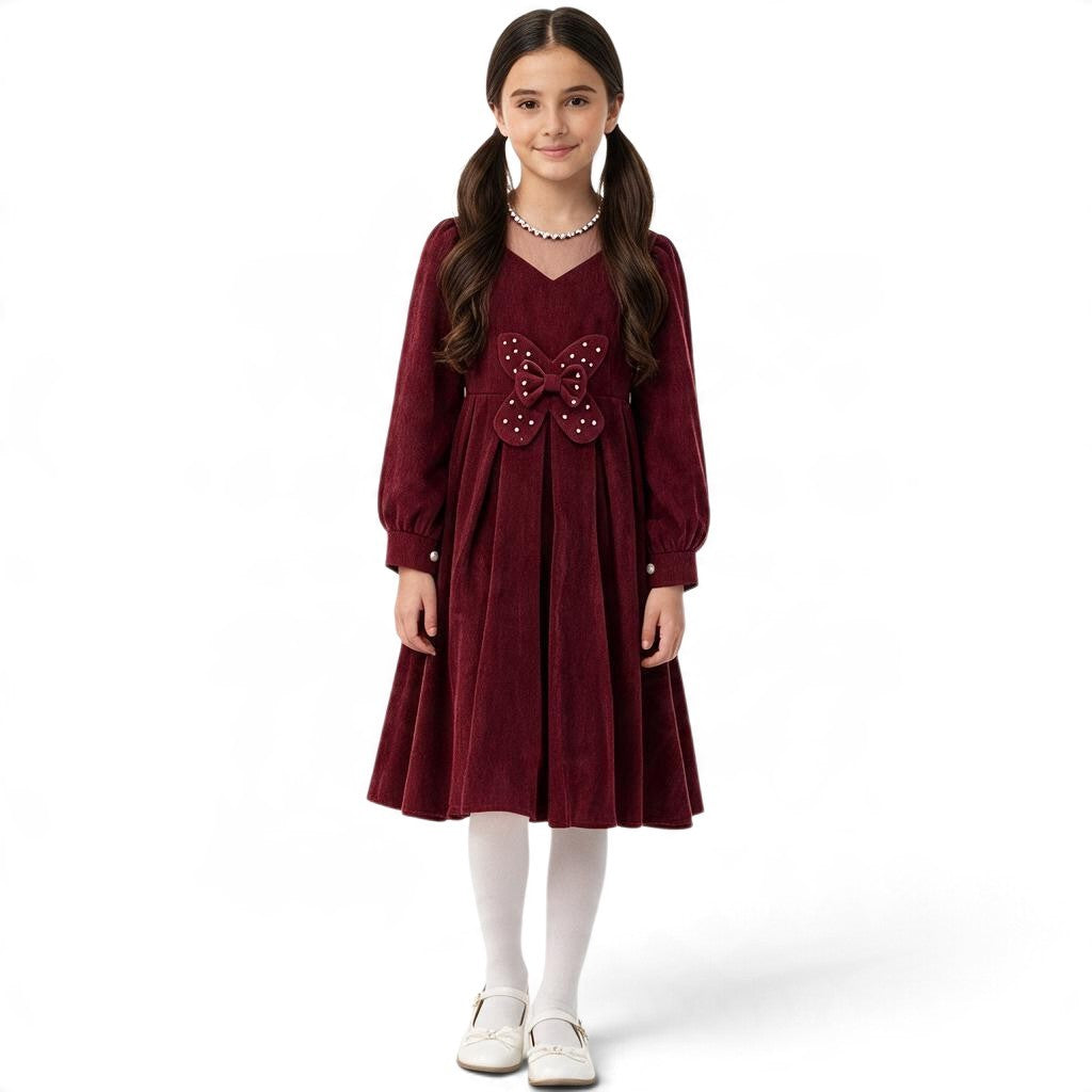 JOANNA FASHION burgundy corduroy long sleeve dress with a pleated skirt and pearl-embellished butterfly waist detail.