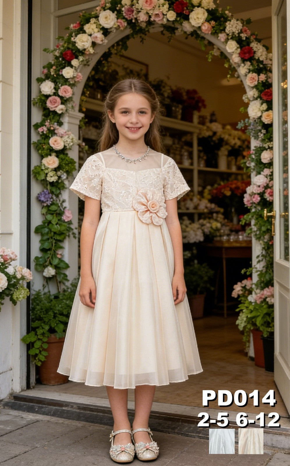 JOANNA FASHION champagne formal dress for girls with lace bodice, tulle skirt, and floral waist detail in a garden
