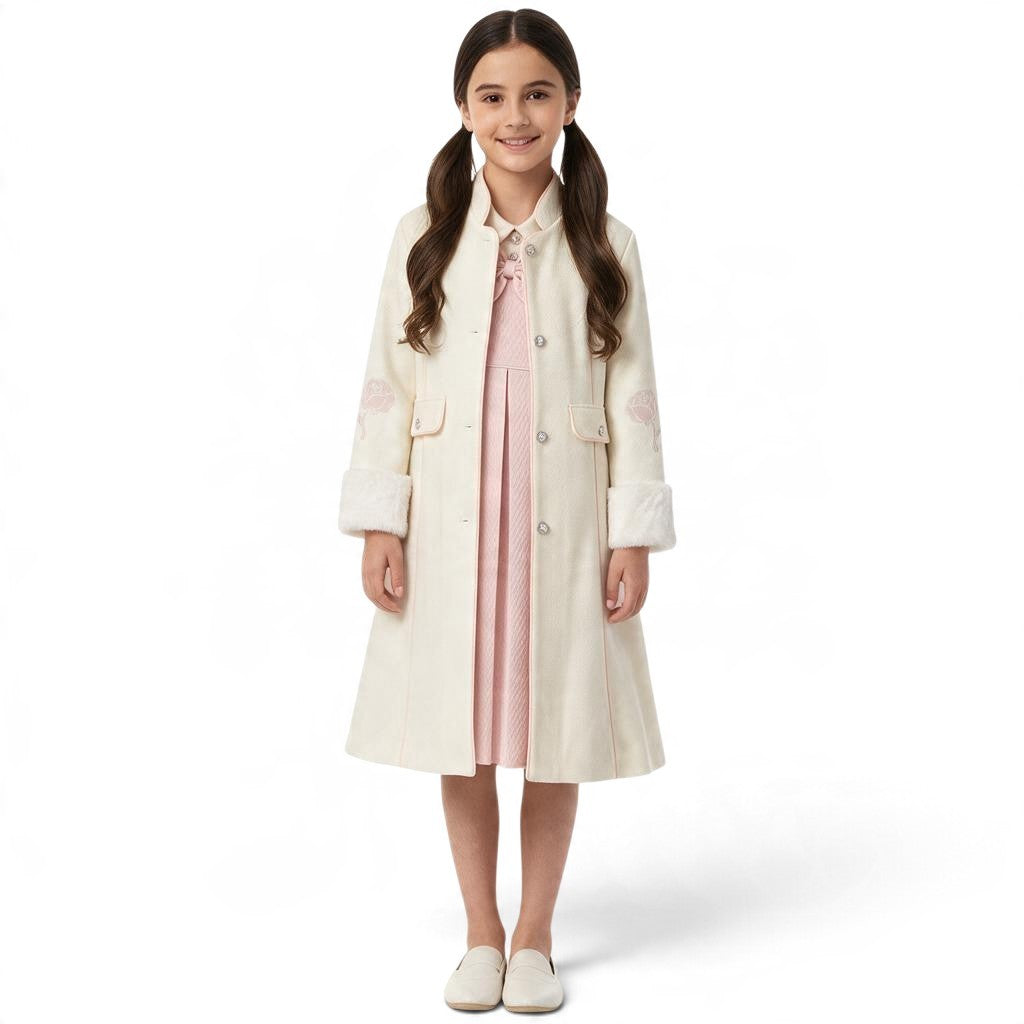 JOANNA FASHION cream long formal coat with floral embroidery and faux-fur cuffs worn by a young girl