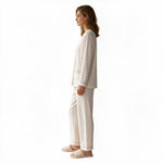 JOANNA FASHION long sleeve pajama set in cream with subtle print, button-down top, and matching relaxed fit pants.
