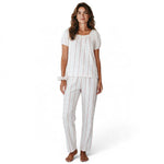 JOANNA FASHION floral print pajama set with puff sleeves, lace trim, and ribbon bow on a woman against white background