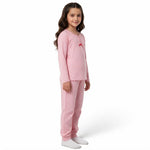 JOANNA FASHION girls pink polka-dot long sleeve pajama set with henley neckline and bow detail on a young model