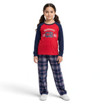 JOANNA FASHION girls long sleeve raglan pajama set with red top and blue plaid bottoms on a young girl