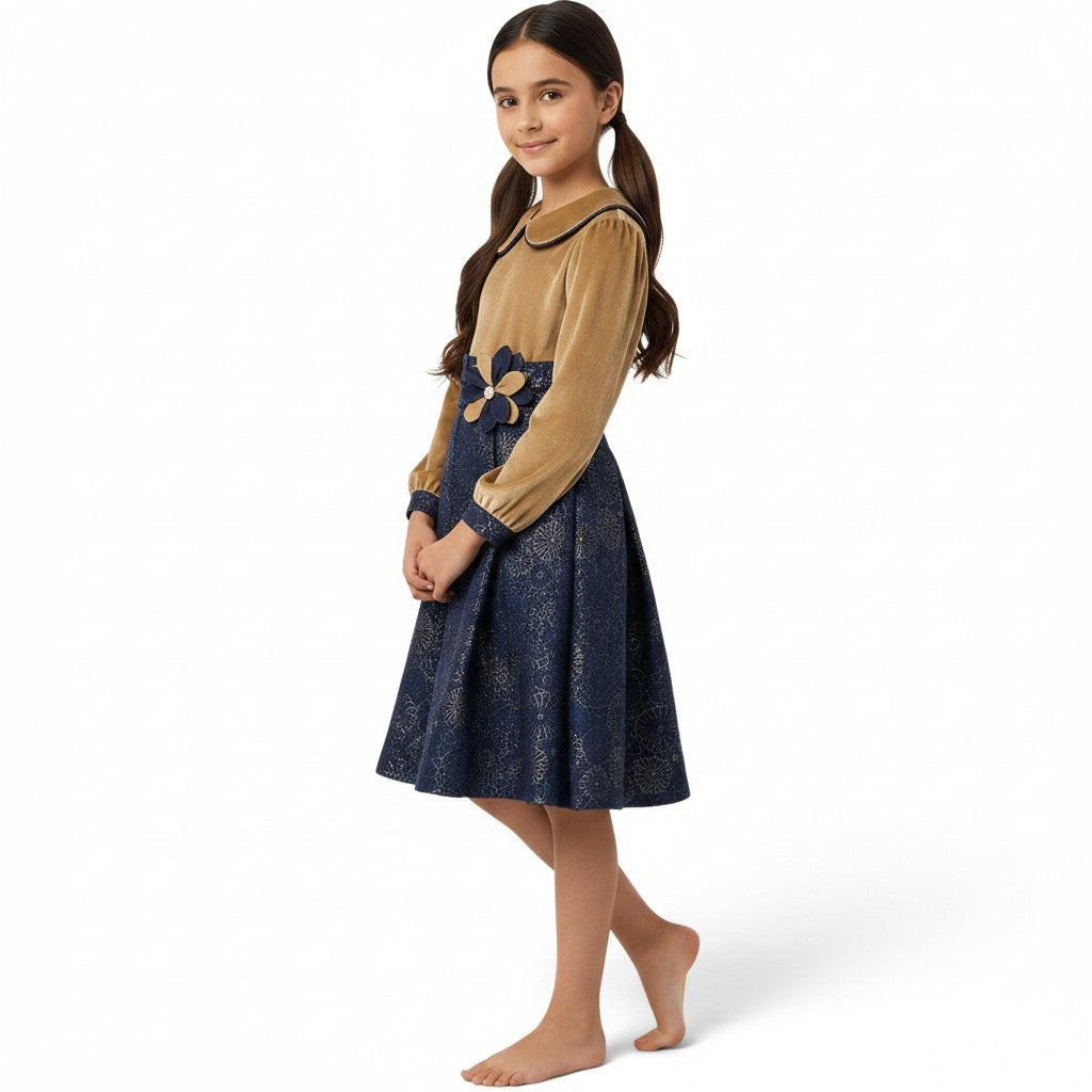 JOANNA FASHION girls' dress with a gold velvet bodice, Peter Pan collar, and a navy blue metallic patterned skirt.