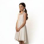 JOANNA FASHION girls' formal dress with pearl-beaded illusion neckline, pleated skirt, and high-low hem in ivory.