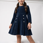 JOANNA FASHION girls navy blue long sleeve corduroy dress with white button details and a drop-waist silhouette