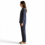 JOANNA FASHION navy blue floral striped pajama set with white piping worn by a woman in profile view