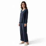 JOANNA FASHION navy blue polka-dot long sleeve pajama set with scalloped trim worn by a woman on a white background