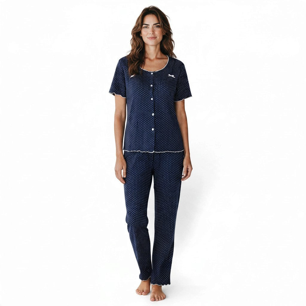 JOANNA FASHION navy blue polka dot pajama set with short sleeves, button-down top, and lettuce-edge trim on a model.