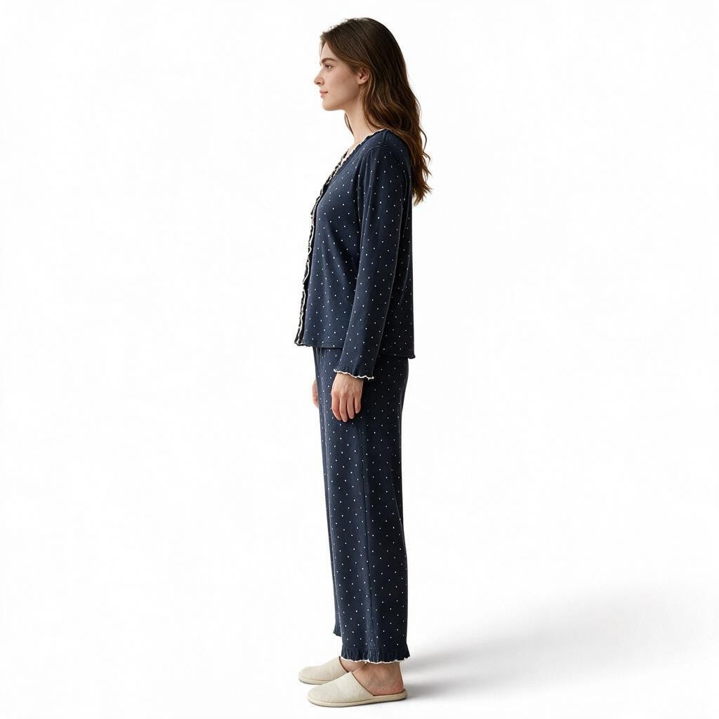 JOANNA FASHION navy blue polka-dot long sleeve pajama set with scalloped trim worn by a woman in profile view