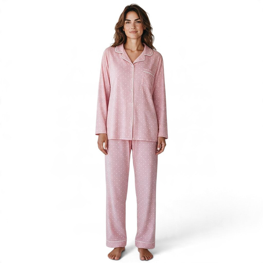 JOANNA FASHION pink polka dot button-down pajama set with white contrast piping worn by a woman on a white background