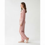 JOANNA FASHION pink ribbed long sleeve lounge set with wide-leg pants and lettuce-edge trim worn by a woman