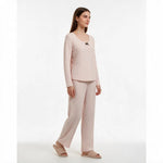 JOANNA FASHION light pink long sleeve pajama set with star print, scoop neck, and black bow detail on a model