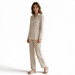 JOANNA FASHION women's beige long sleeve pajama set with black floral print, notched collar, and piping details.
