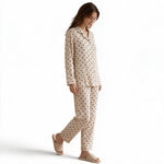 JOANNA FASHION women's beige long sleeve button-down pajama set with a dark polka dot print and piped trim details.
