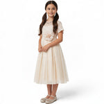 JOANNA FASHION champagne formal dress for girls with lace bodice, floral waist detail, and layered tulle skirt.