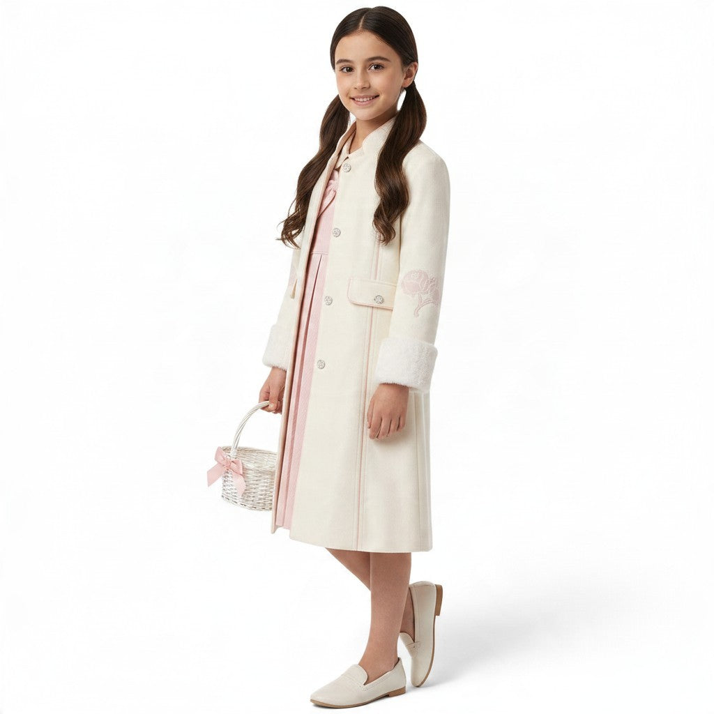 JOANNA FASHION cream long formal coat with floral sleeve embroidery and faux-fur cuffs worn by a young girl