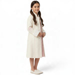 JOANNA FASHION cream long formal coat with floral sleeve embroidery and faux-fur cuffs worn by a young girl