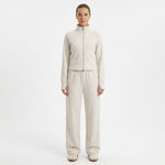 JOANNA FASHION cream full zip track jacket and wide leg lounge pant set worn by a model on a white background