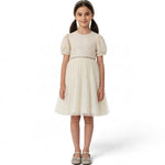 JOANNA FASHION cream party dress with puff sleeves, embellished bodice, and voluminous tulle skirt on a young girl.
