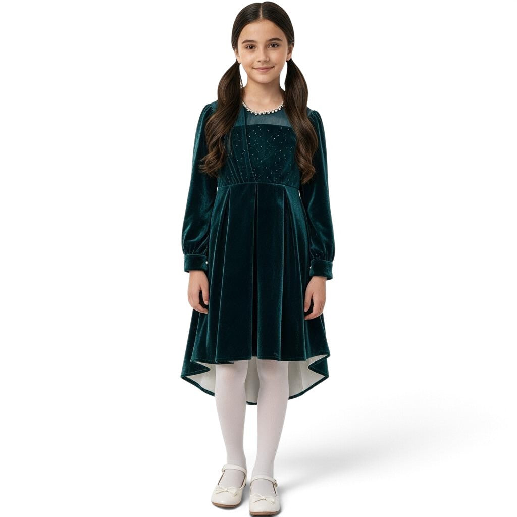 JOANNA FASHION emerald green velvet high-low dress with sparkling bodice and pearl-trimmed sheer neckline on a girl