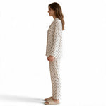 JOANNA FASHION women's long sleeve button-down pajama set in cream with a small black floral print and piping detail.