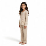 JOANNA FASHION girls' beige long-sleeve button-down pajama set with scalloped lace trim on cuffs and hem.