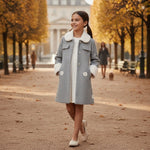 JOANNA FASHION girls grey herringbone winter coat with white faux fur collar and floral applique in a park setting