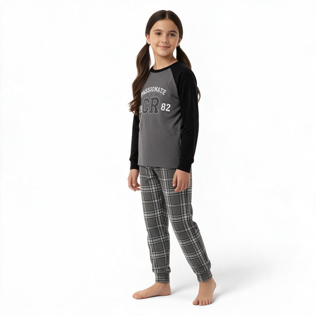 JOANNA FASHION girls long sleeve raglan pajama set with grey and black graphic top and coordinating plaid bottoms