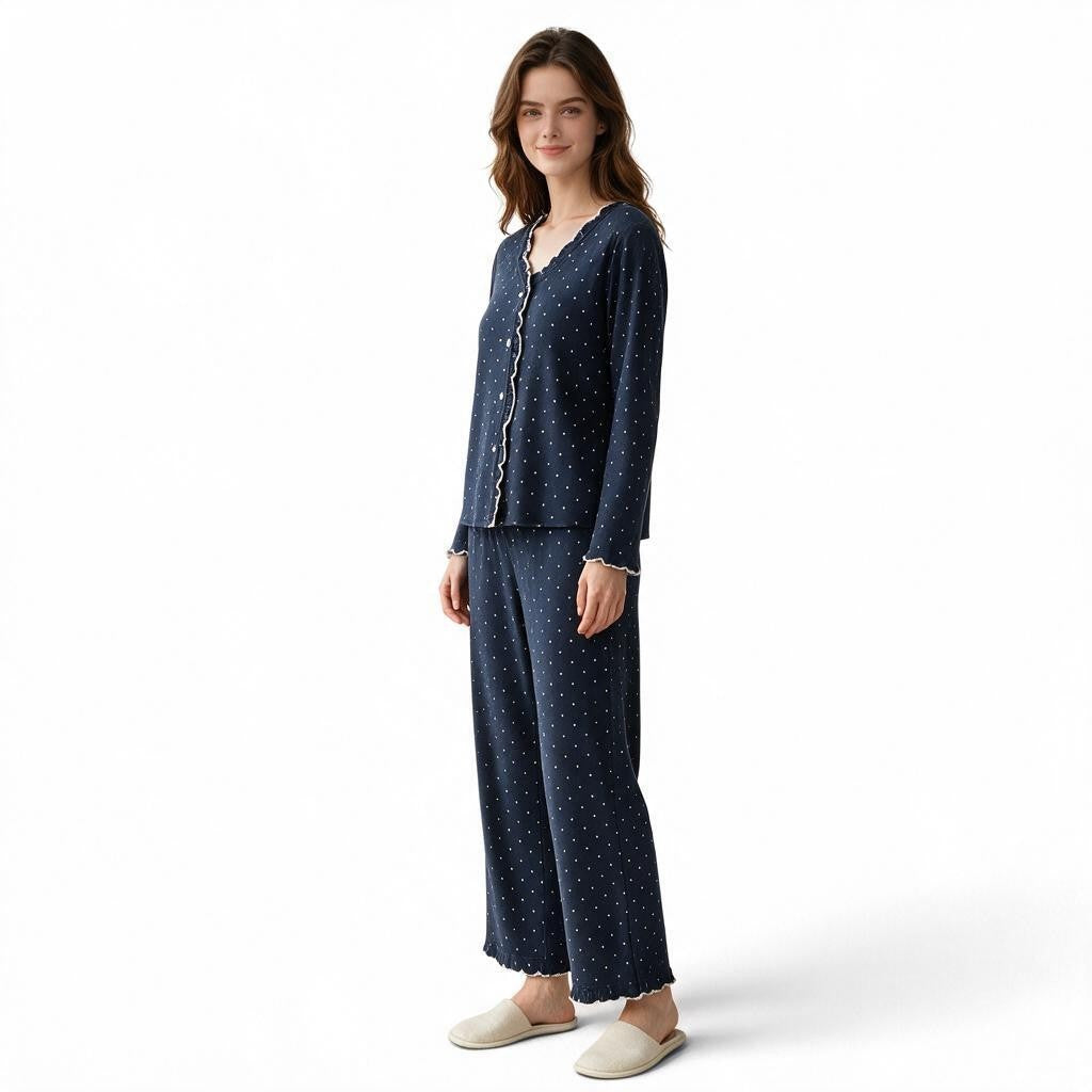 JOANNA FASHION navy blue polka-dot long sleeve pajama set with scalloped trim worn by a woman on a white background