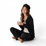 JOANNA FASHION three-piece polka dot pajama set with cardigan, tank top, pants, and headband on a smiling woman